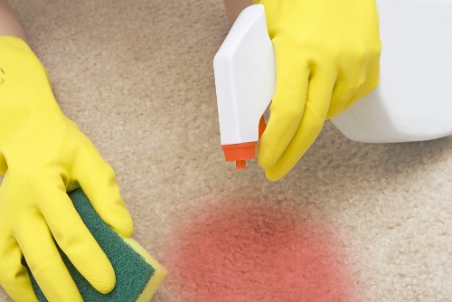 Professional office cleaners maintaining a clean workspace in N6