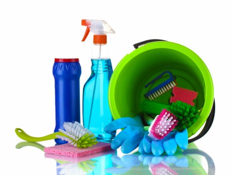Carpet cleaning technician preparing equipment for a UK service appointment