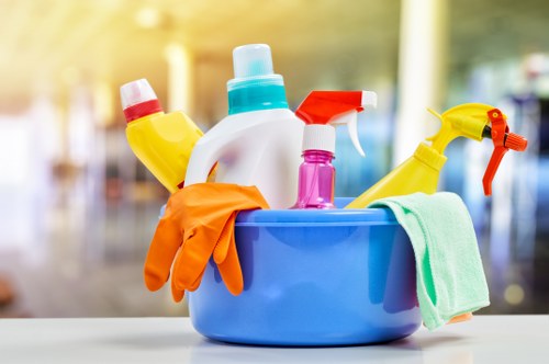 Carpet cleaning technician preparing equipment safely